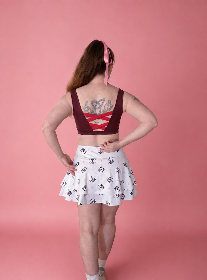 Sally Slater skort worn, back view with ruffle detail